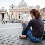 Young female tourist at St. Peter's square