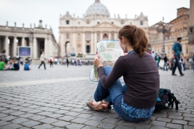 Young female tourist at St. Peter's square